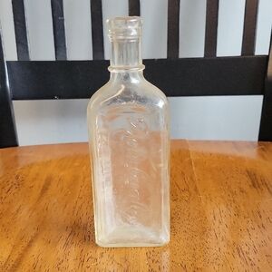 Vintage medicine bottle Rawleigh's 6.5" tall clear glass